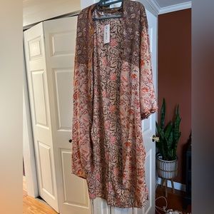 Long sleeve, very light weight outer cover up. From 12th Tribe. Never been worn